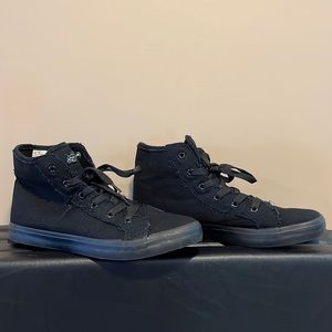 Revolution dancewear women’s lace up black sneaker.